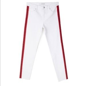 White Skinny Jeans with red and black side stripes